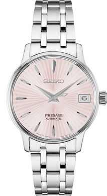  Ladies Seiko Watch SRP839. This Presage Cocktail Time model is shown in a stainless steel case and band and a pink dial with a date window. Features include: manual and automatic winding capabilities, power reserve, and water resistance up to 50 meters.