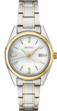 Ladies Seiko Watch SUR636. This Essentials model is shown in a two tone case and band and a mother of pearl dial with a date window. Features include: Lumibrite hands, sapphire crystal, and water resistance up to 100 meters. 