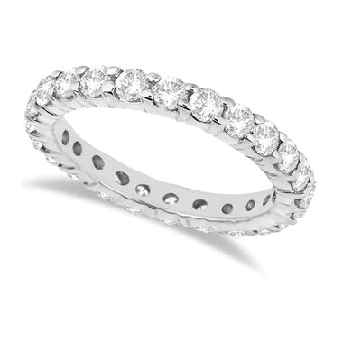 14 karat white gold diamond eternity band of SI2 / I1 clarity and I / K color. This band is available in 1 carat total weight up to 3 carat total weight.